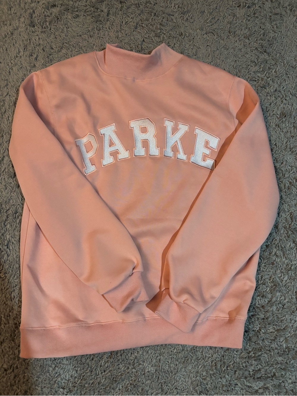 Pink and white sweatshirt